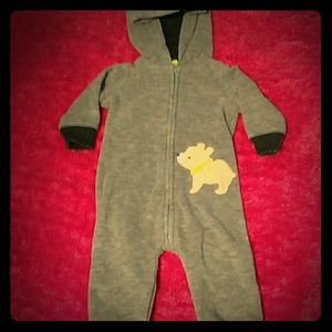 A one piece soft material with a hood.